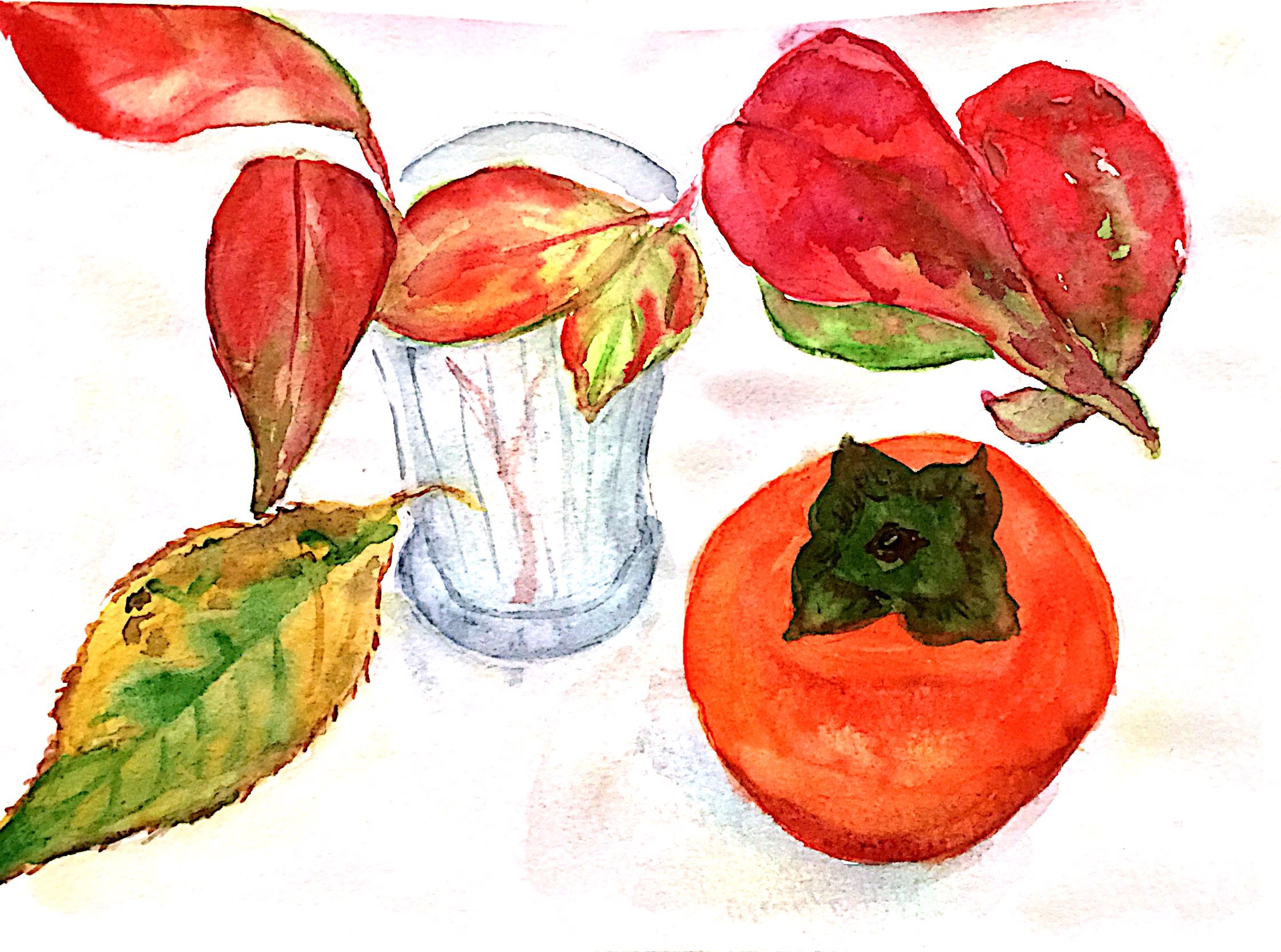 柿の実と紅葉した落ち葉